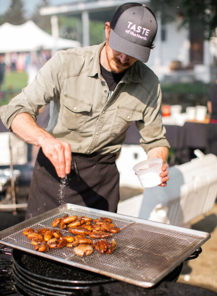 Chef Josh seasoning potatoes. Photo by Zack Griswold.