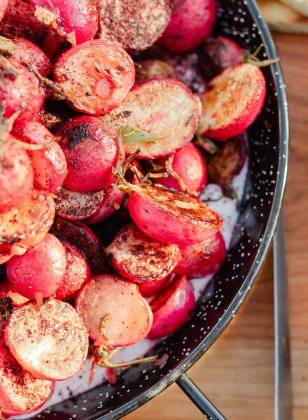 Charred radishes with labne. Photo by Great Blue Photo Co.