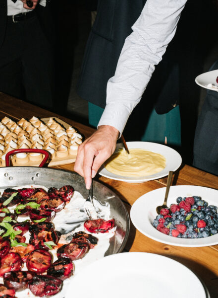Grilled plums with honey ricotta. Photo by Gabby Riggierri